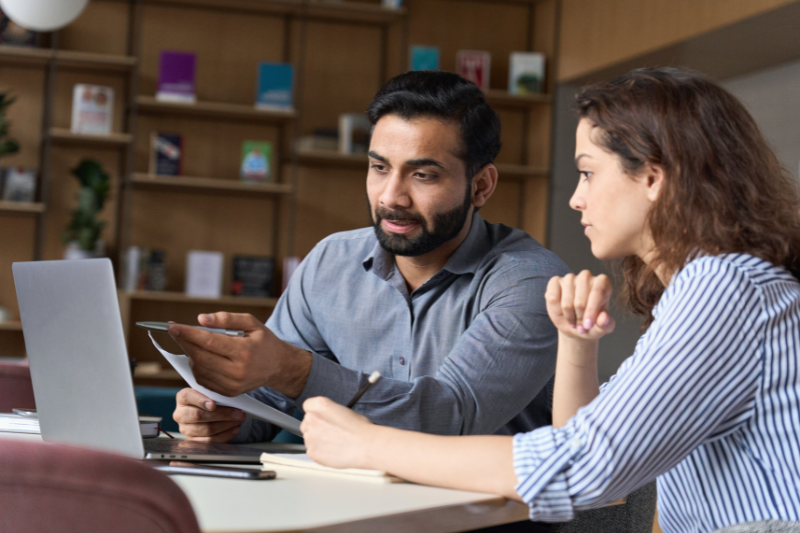 overseas hiring manager consulting with client
